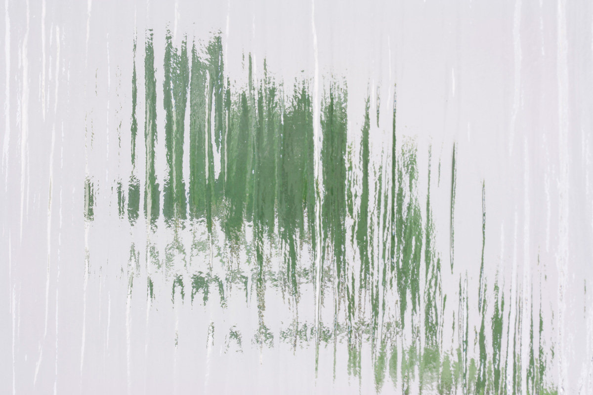 Strukturerat Cotswold-glas med ojämnt mönster som ger insynsskydd.